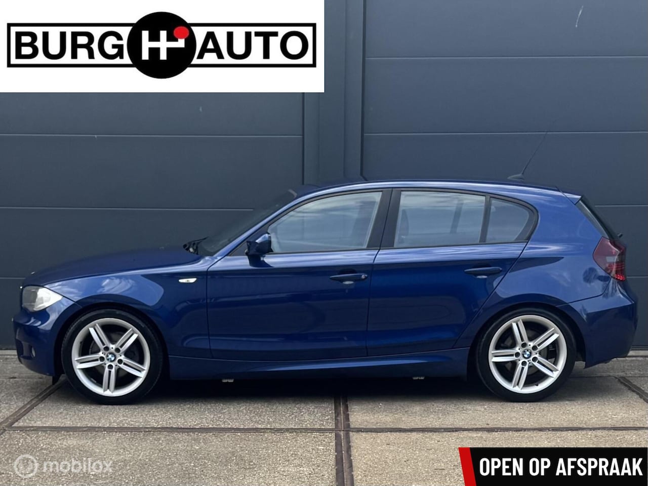 BMW 1-serie - 118i Business Line Sport - APK T/M 03-04-2027 - M*PAKKET - 18'' LMV - ECC - NAVI - CRUISE - AutoWereld.nl