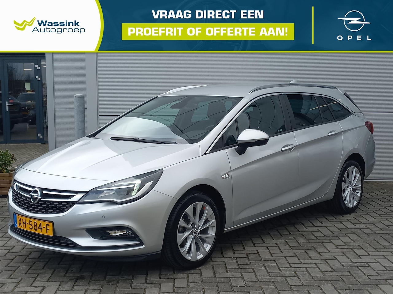 Opel Astra Sports Tourer - 1.4T 150pk Business+ | Climate control | Navigatie | 17" LM velgen | Parkeersensoren v+a | - AutoWereld.nl