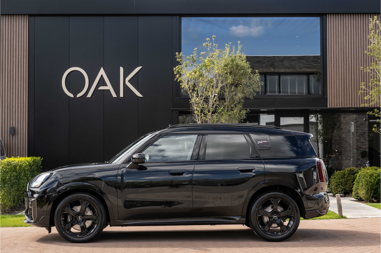 MINI Countryman - 2.0 S ALL4 John Cooper Works XL | Panorama | Leder | Memory | Trekhaak | 19"LM | Midnight - AutoWereld.nl