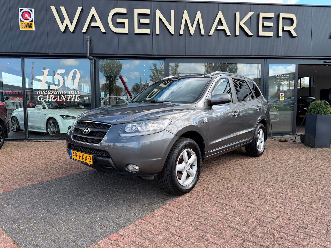 Hyundai Santa Fe - 2.7i V6 4WD Style AUT|Leder|Trekhaak|NAVIGATIE - AutoWereld.nl
