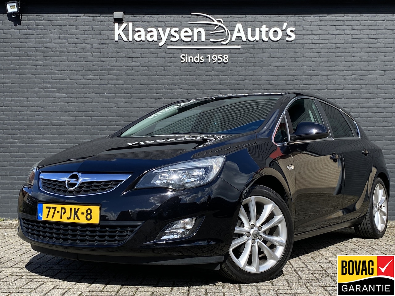 Opel Astra - 1.4 Turbo 120 pk Sport | leder interieur | sportstoelen | airco | trekhaak | stoelverwarmi - AutoWereld.nl