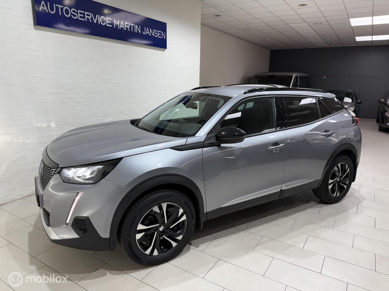 Peugeot 2008 - 1.2 PureTech Allure Pack Carplay - AutoWereld.nl