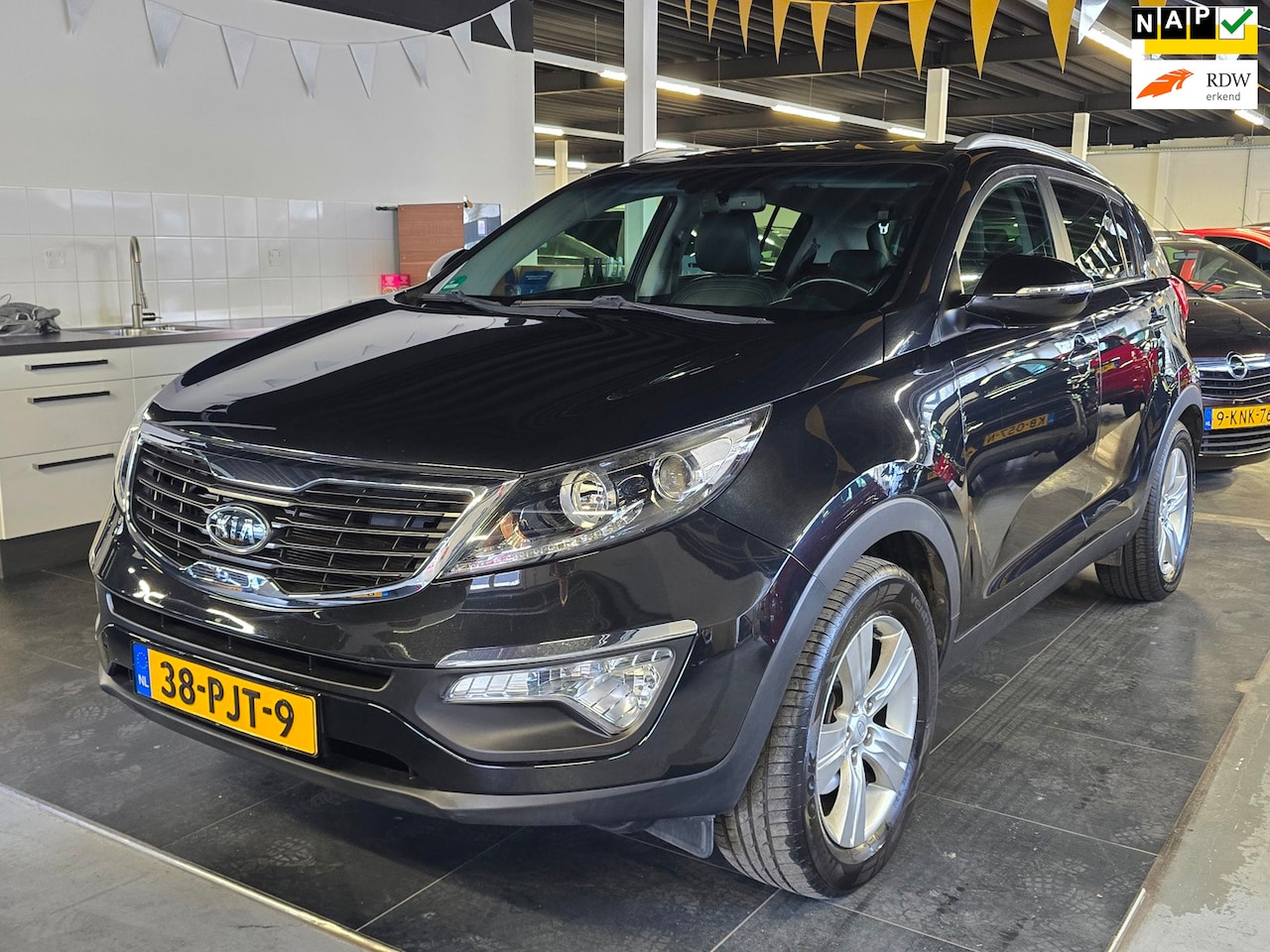 Kia Sportage - 2.0 X-ecutive Plus Pack/AUTOMAAT/CRUISE/N.A.P/ - AutoWereld.nl