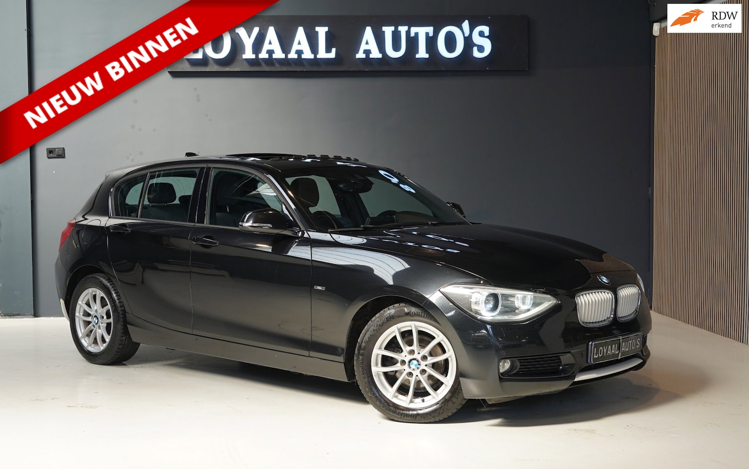 BMW 1-serie - 116i Business+ | NAVI | AIRCO | CRUISE | PDC | STOELVERW. | APK. - AutoWereld.nl