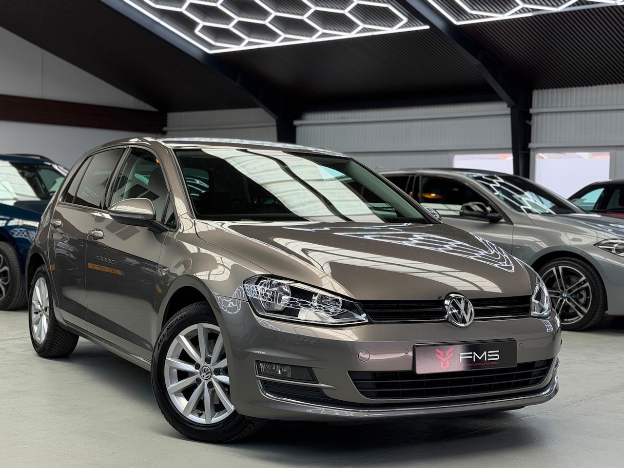 Volkswagen Golf - 1.4 TSI Lounge Edition CarPlay - AutoWereld.nl
