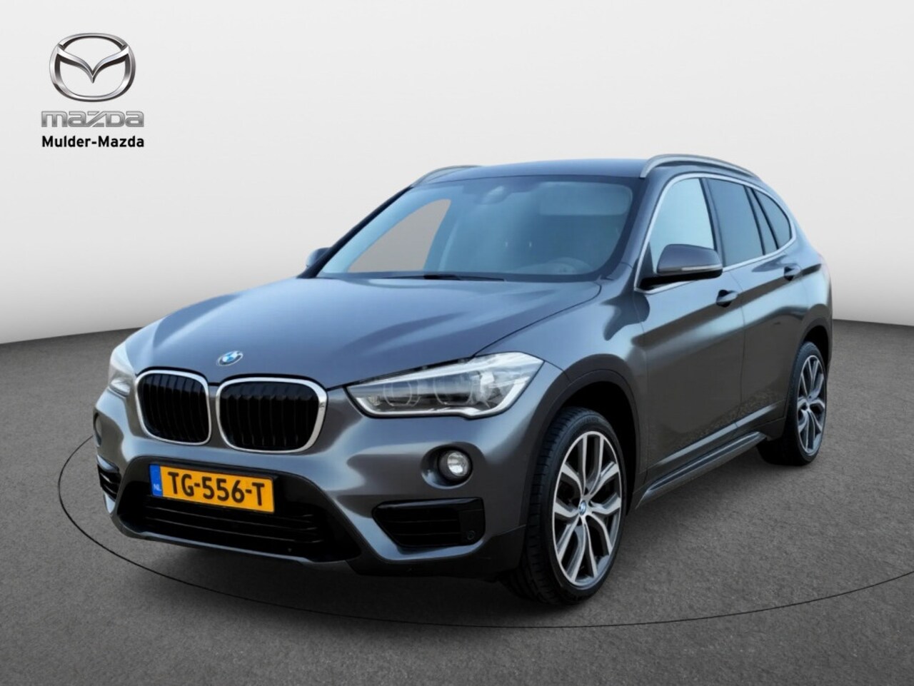 BMW X1 - sDrive18i High Executive | Leder | Trekhaak | Stoelverwarming - AutoWereld.nl