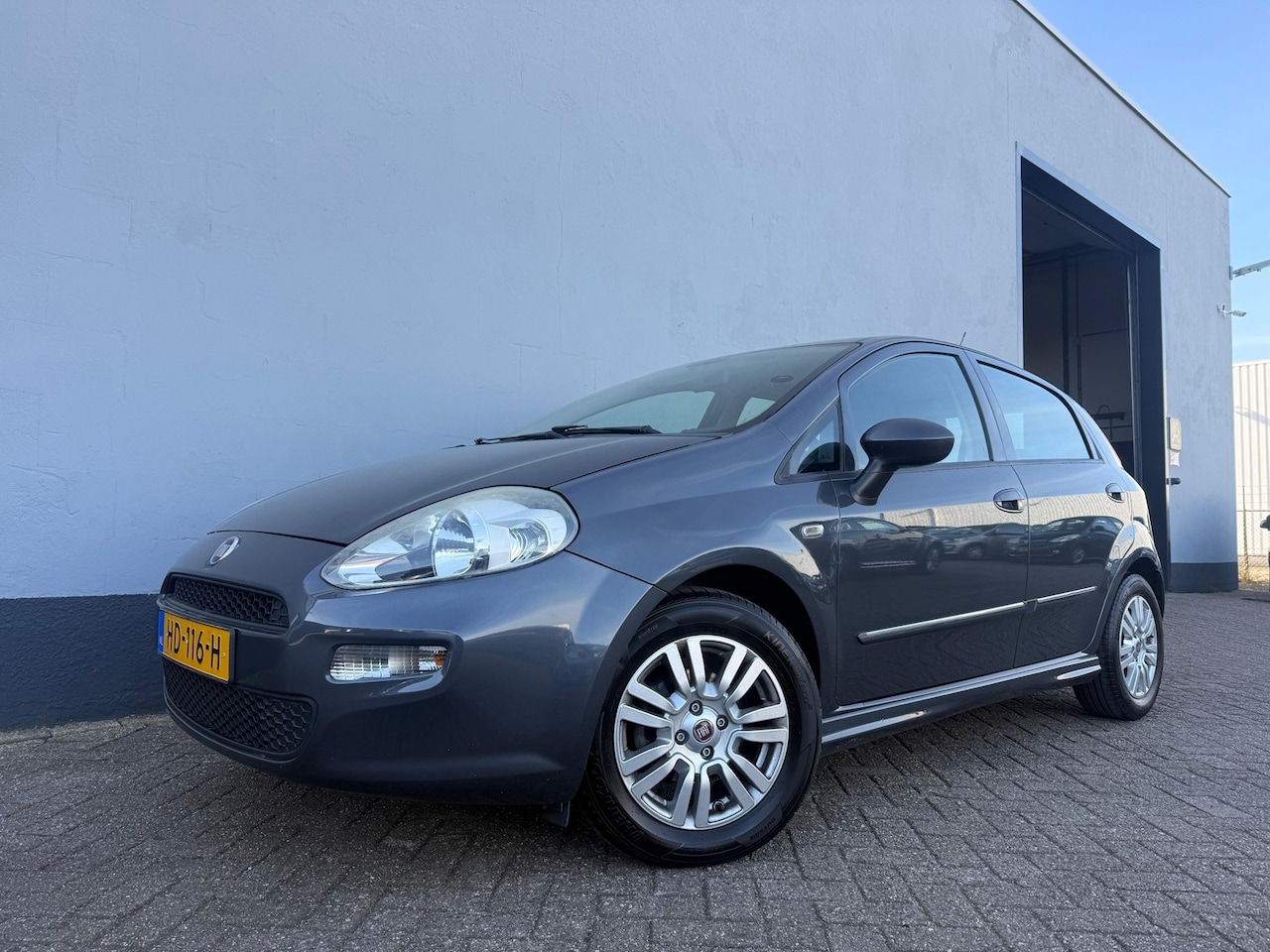 Fiat Punto Evo - 0.9 TwinAir Racing - Airco - Cruise Control - AutoWereld.nl