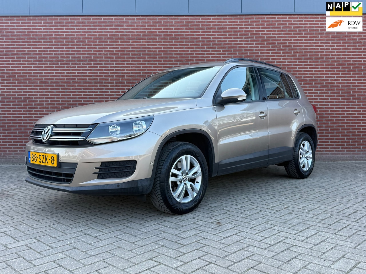 Volkswagen Tiguan - 1.4 TSI Comfort&Design / Nap / Airco / Cruise control / trekhaak - AutoWereld.nl