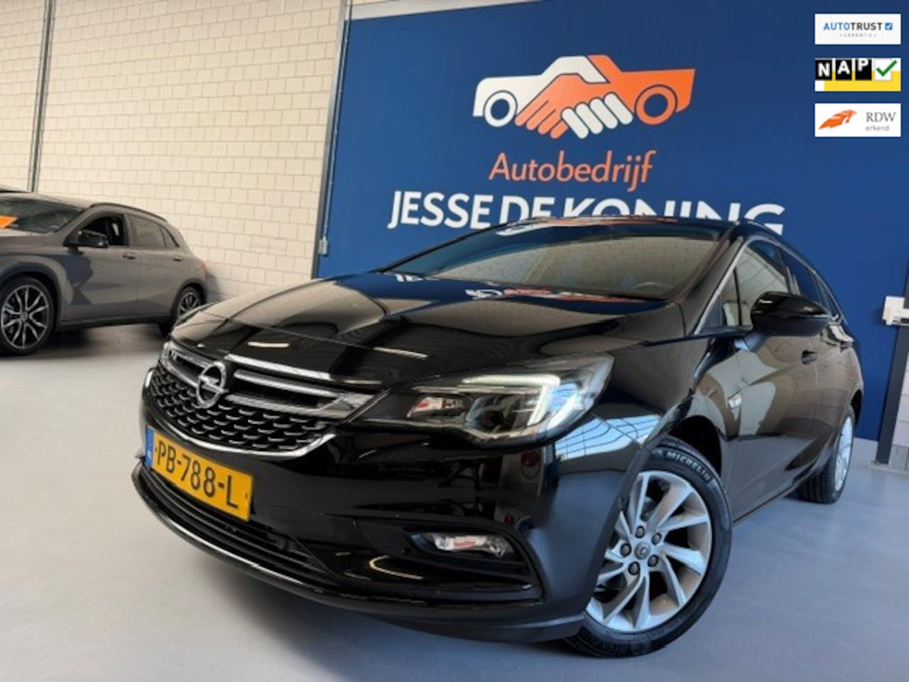 Opel Astra Sports Tourer - 1.0 Innovation / bj.2017 / navigatie/camera / NAP met 143702 km.en APK tot 04/2027 / sport - AutoWereld.nl