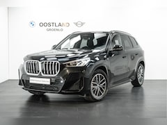 BMW X1 - sDrive20i M Sport Automaat / Trekhaak / Sportstoelen / M Adaptief onderstel / Achteruitrij