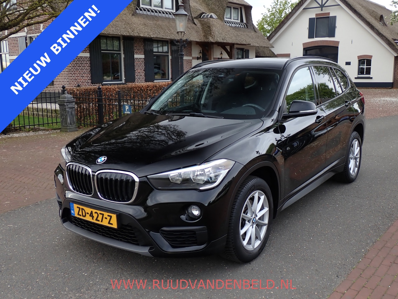 BMW X1 - sDrive18i !! AUTOMAAT !! / SPORTSTOELEN / CRUISE / NAVI / STOELVERWARMING - AutoWereld.nl