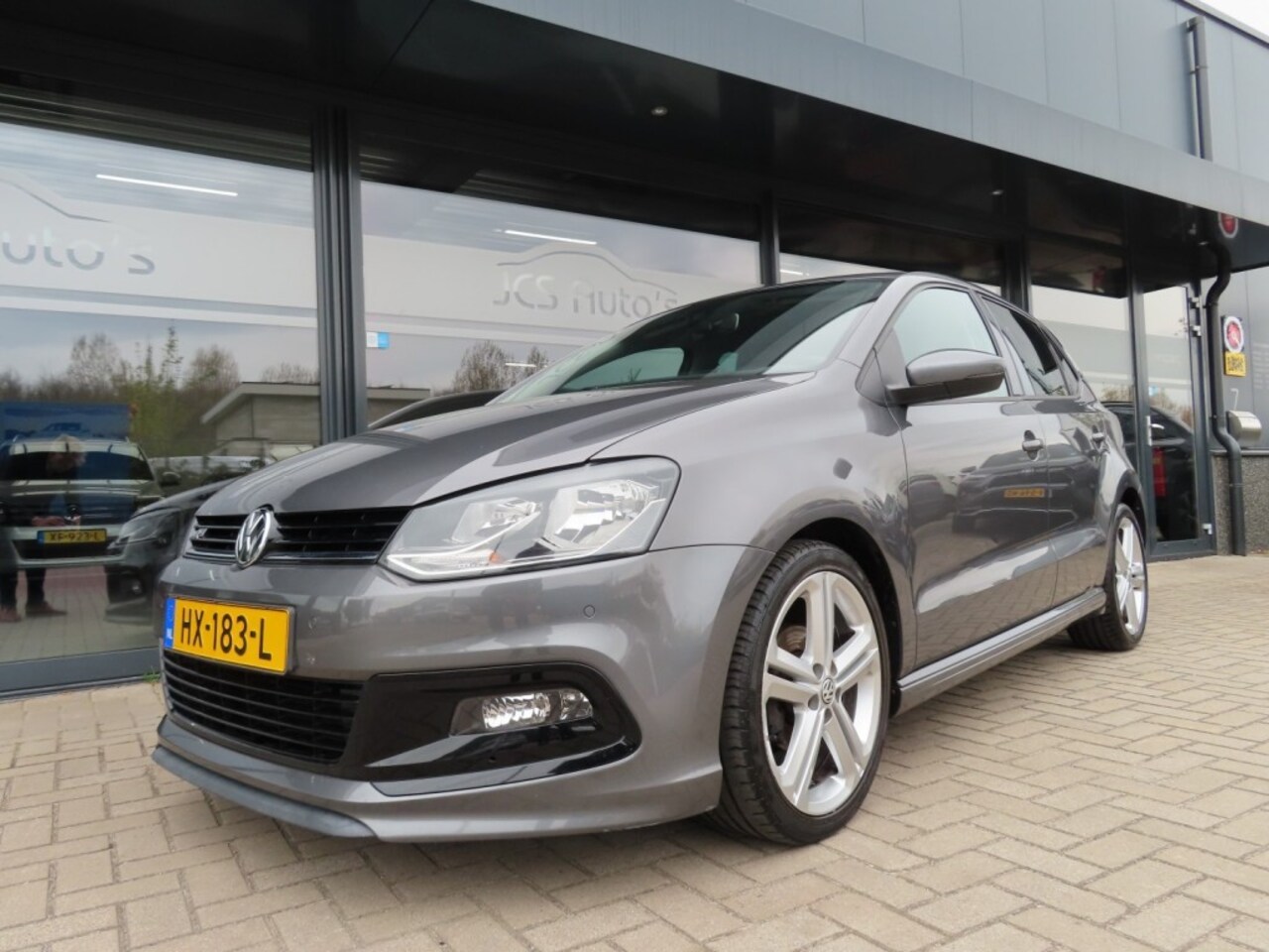 Volkswagen Polo - 1.2 TSI Edition R Ecc Navi Pdc 17 Inch 2016 - AutoWereld.nl