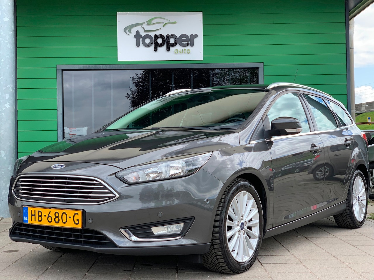 Ford Focus Wagon - 1.0 Titanium Edition|2e Eigenaar|Navigatie| - AutoWereld.nl