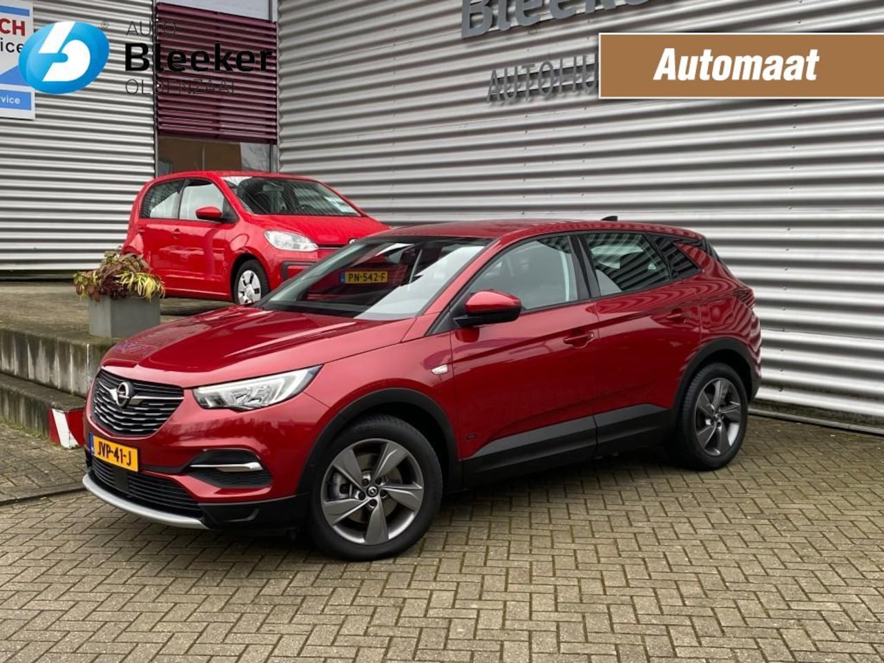 Opel Grandland - 1.6T Hybrid 229Pk Business Ed. Automaat LED Navi Cruise Stoelverwarming - AutoWereld.nl