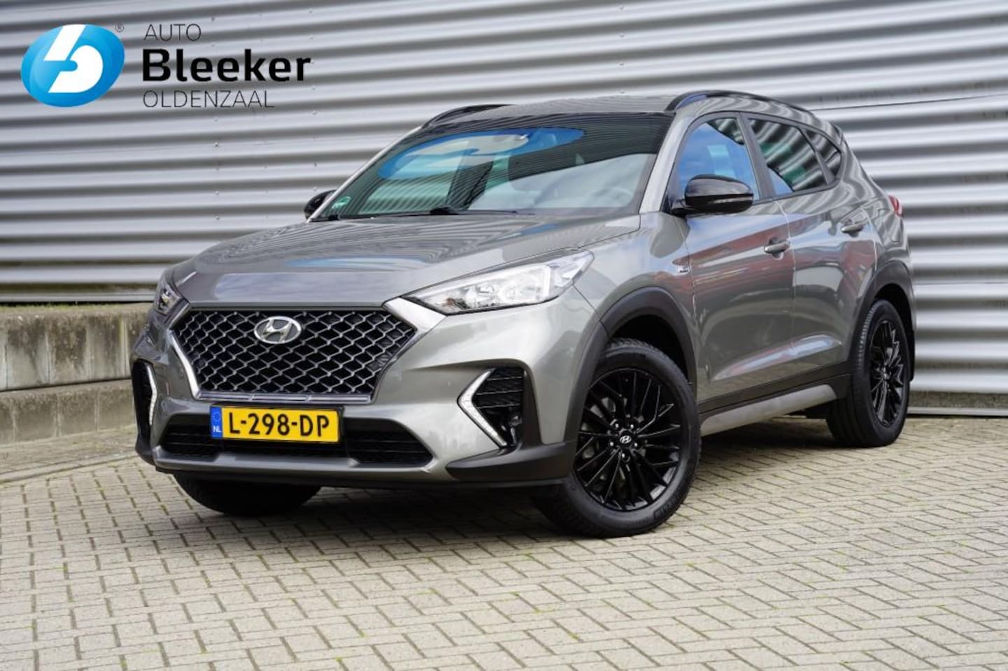 Hyundai Tucson - 1.6 GDI Premium N-Line Ecc Navi Cruise Trekhaak - AutoWereld.nl