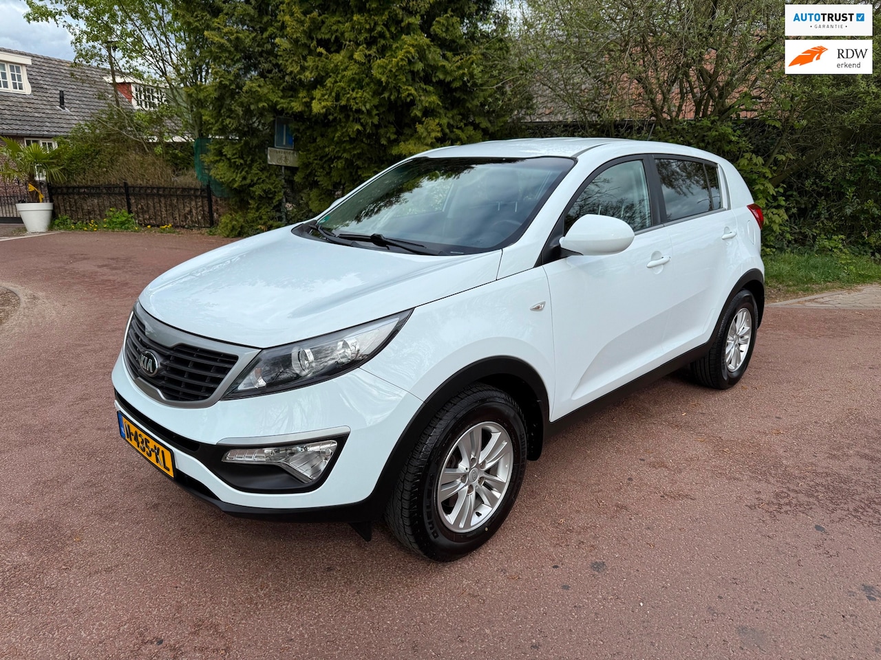 Kia Sportage - 1.6 GDI 20th Anniversary Airco / Navi / PDC / Cruise / APK - AutoWereld.nl