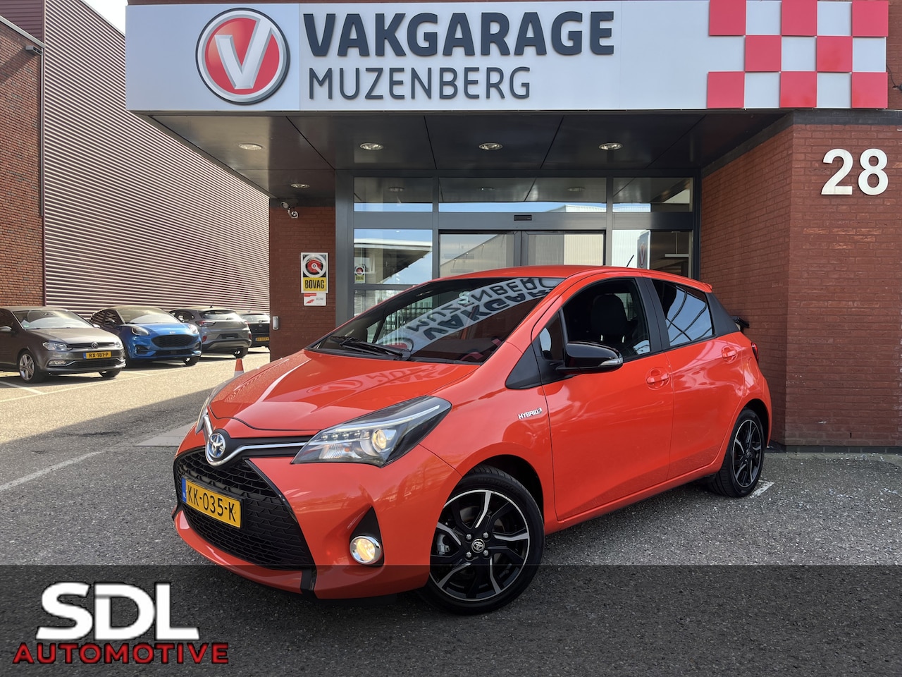 Toyota Yaris - 1.5 Hybrid Orange Sport // LED // NAVI // CLIMA // CRUISE // BLUETOOTH // - AutoWereld.nl
