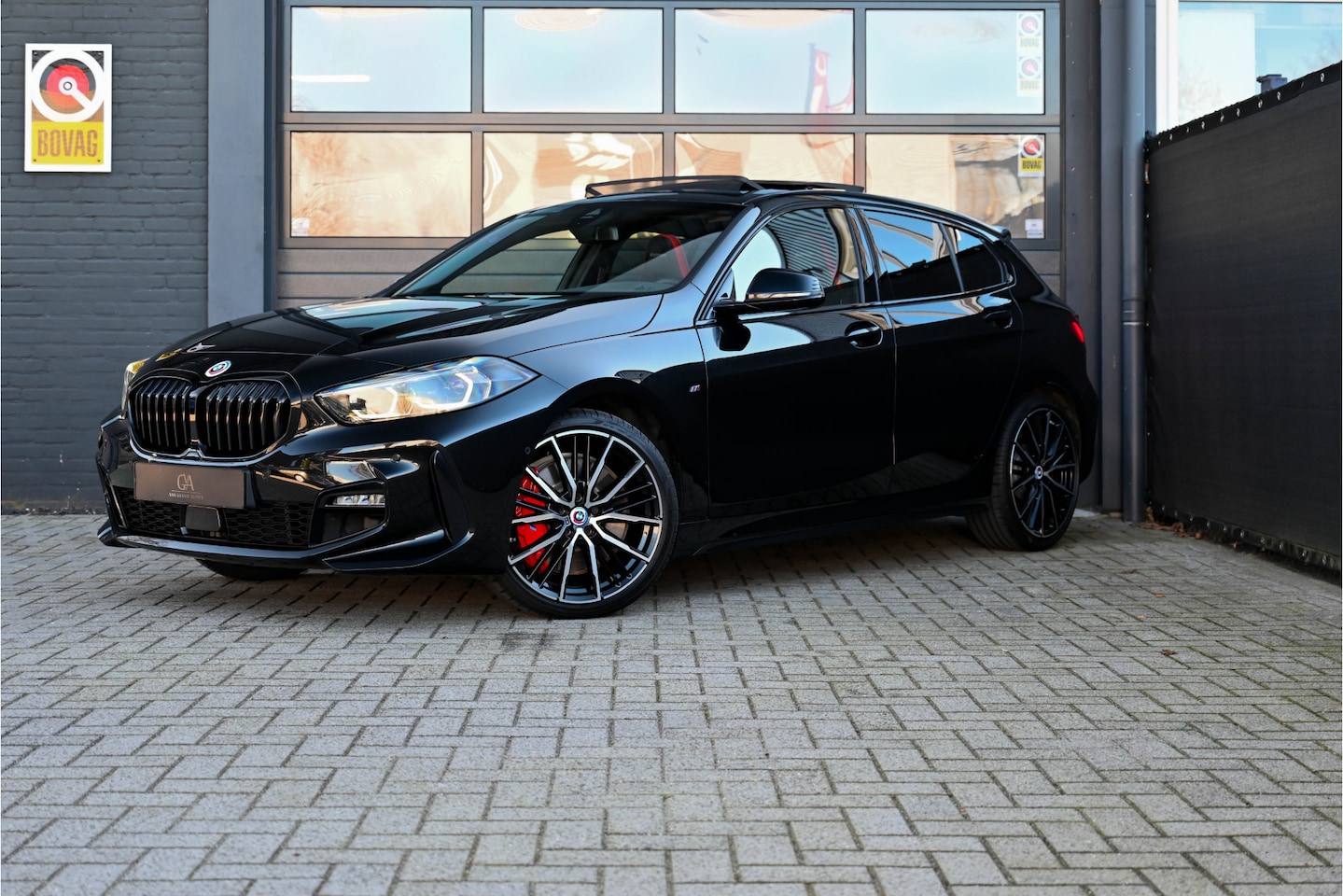 BMW 1-serie - 120i M Sport Edition Pano,Camera - AutoWereld.nl