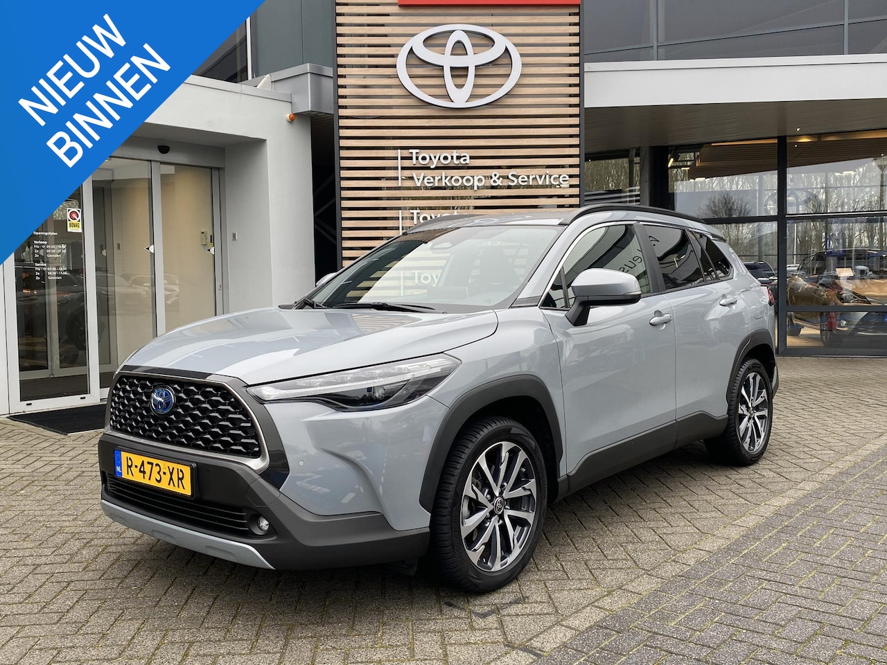 Toyota Corolla Cross - 2.0 High Power Hybrid First Edition BLIND-SPOT ELEK-ACHTERKLEP KEYLESS LM-VELGEN PARK-SENS - AutoWereld.nl
