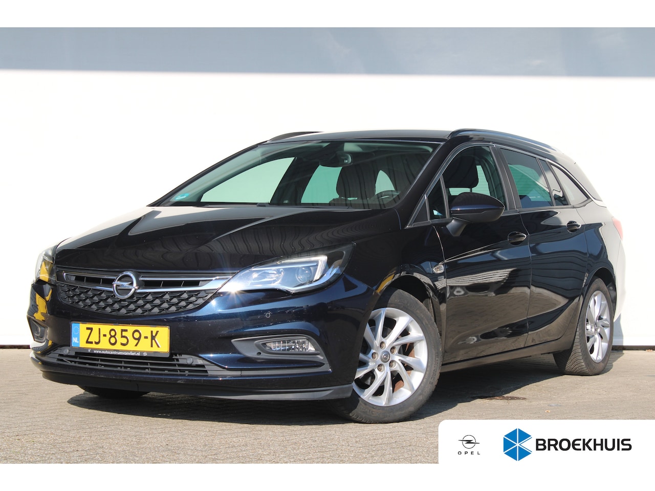 Opel Astra Sports Tourer - 1.0 Turbo 120 Jaar Edition | Trekhaak | Navigatie | Cruise control | Comfort stoelen | Par - AutoWereld.nl
