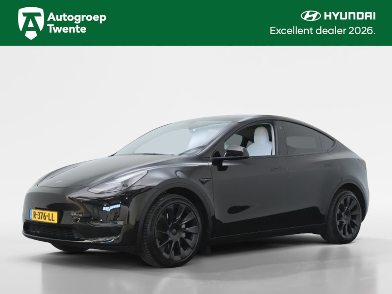 Tesla Model Y - Long Range AWD 75kWh | Panoramdak | Navigatie | Stoelverwarming - AutoWereld.nl