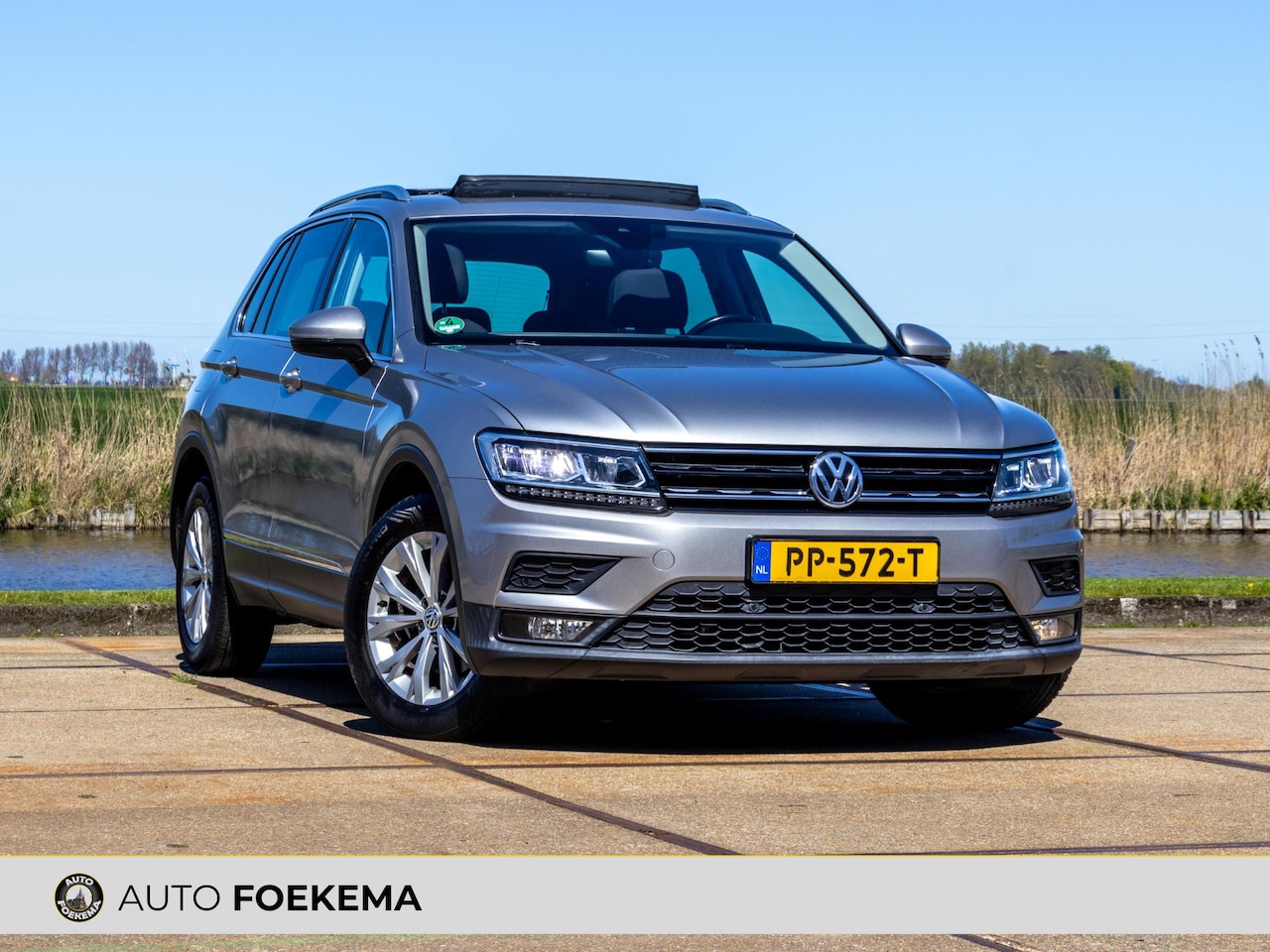 Volkswagen Tiguan - 2.0 TDI Comfortline Business Lane assist LED Pano - AutoWereld.nl