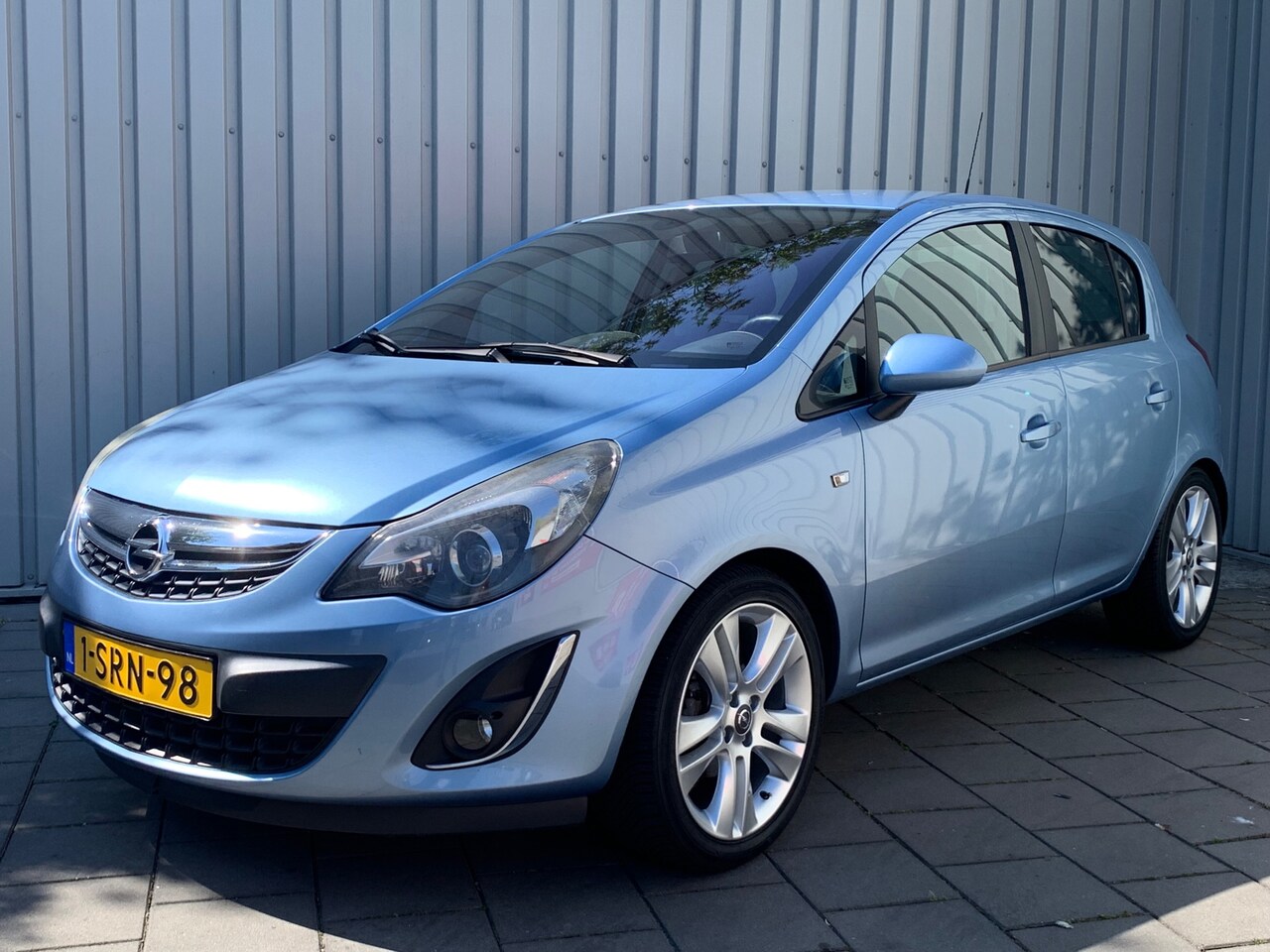 Opel Corsa - 1.4-16V Cosmo|Navigatie|Climate Control| - AutoWereld.nl