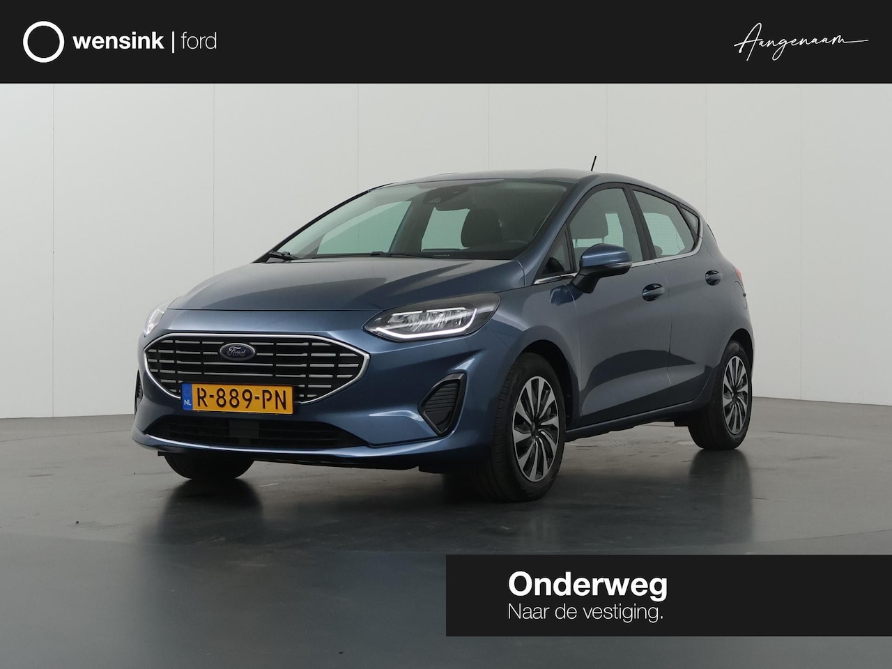 Ford Fiesta - 1.0 EcoBoost Hybrid Titanium | Navigatie | Cruise Control Adaptief | Climate Control | App - AutoWereld.nl