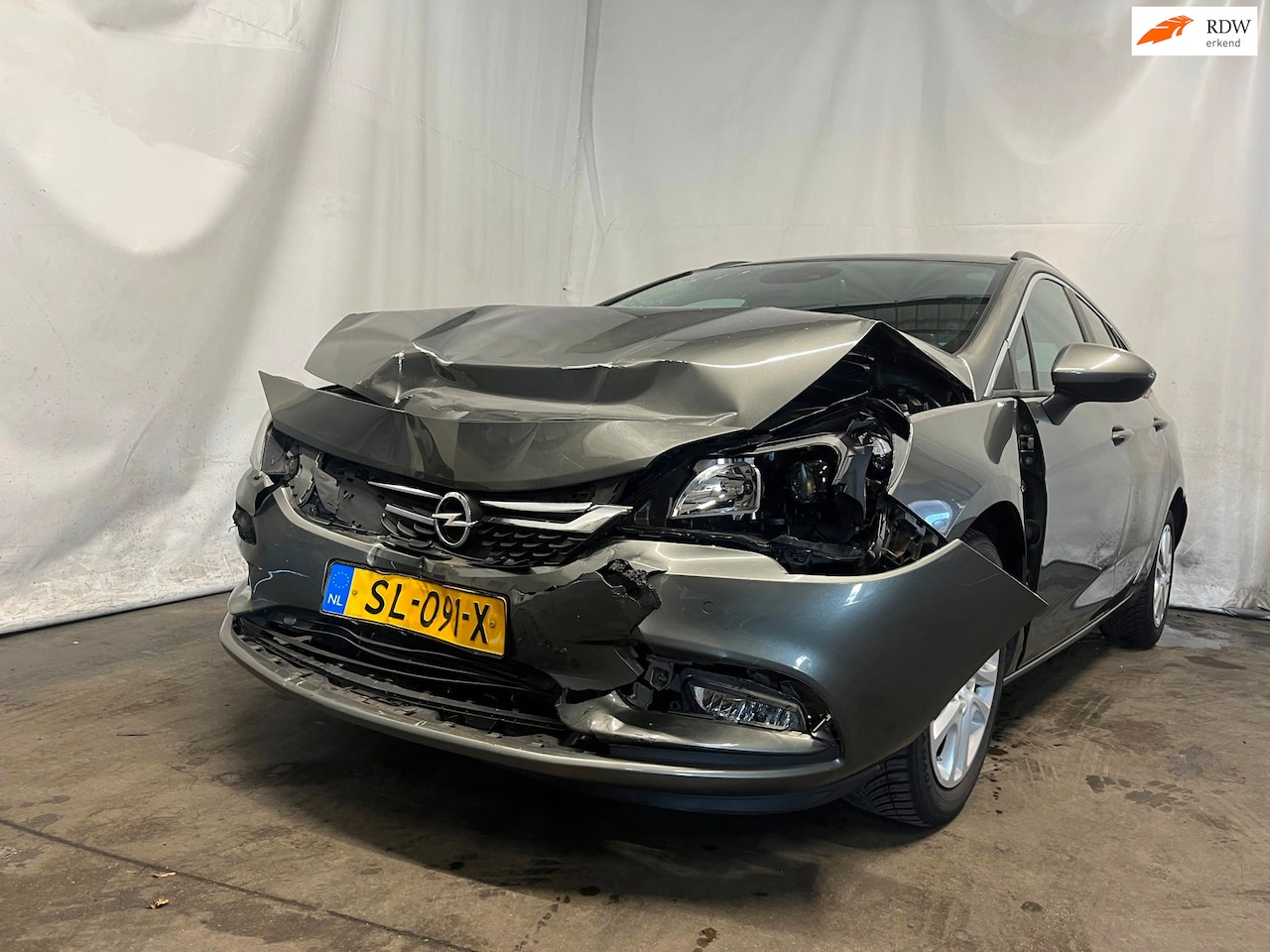 Opel Astra Sports Tourer - 1.0 Innovation - Schade - AutoWereld.nl