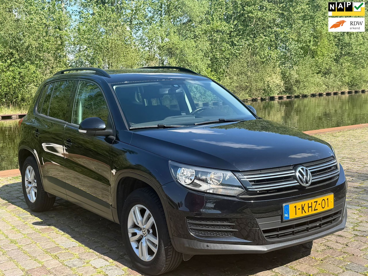 Volkswagen Tiguan - 1.4 TSI Comfort&Design Airco cruis control parkeer sensor trekhaak - AutoWereld.nl