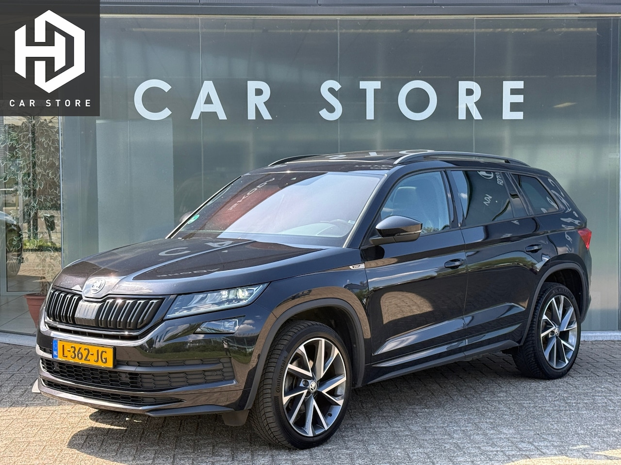 Skoda Kodiaq - 1.5 TSI DSG Sportline Pano|Memory|360cam|Canton|Sfeerverlichting - AutoWereld.nl