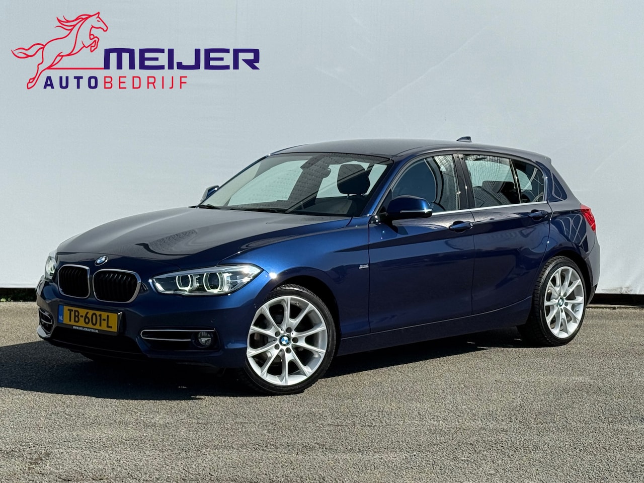 BMW 1-serie - 118d High Executive Sport | Leer | Xenon | Stoelverwarming | Clima | Cruise | Navi | Trekh - AutoWereld.nl