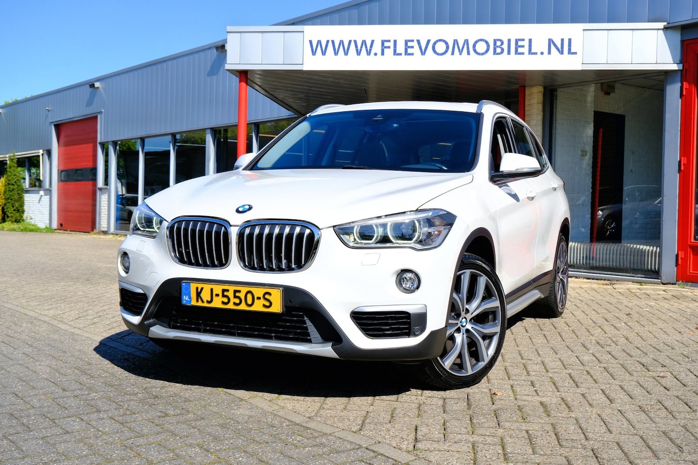 BMW X1 - XDrive20i 192pk Centennial High Executive Aut. Pano|Leder|Sportstoelent|LMV - AutoWereld.nl
