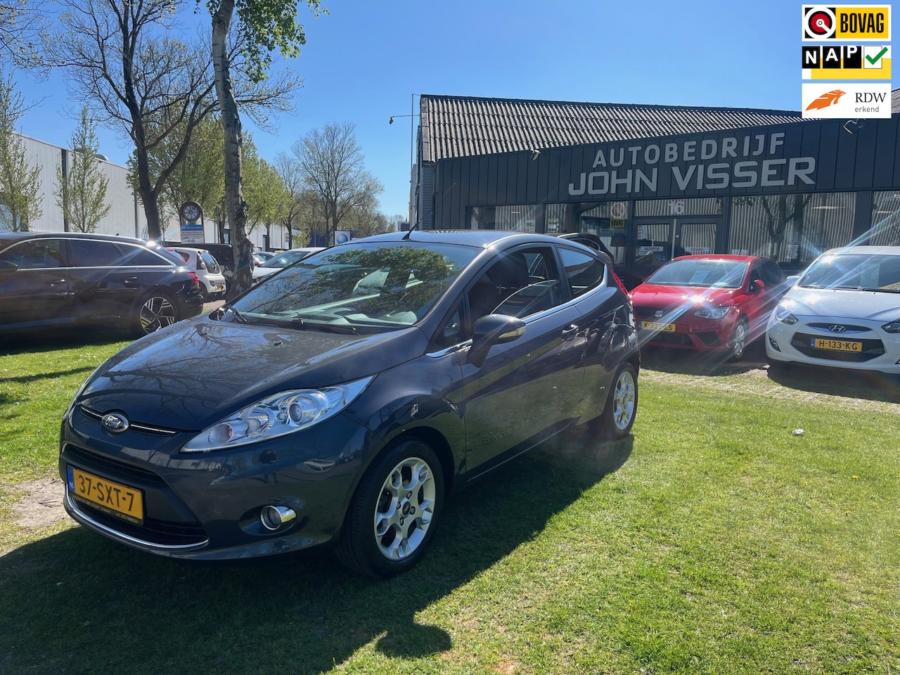 Ford Fiesta - 1.25 Titanium * stijlvolle & zuinige hatchback * airco * cruise * stuurwielbediening * - AutoWereld.nl