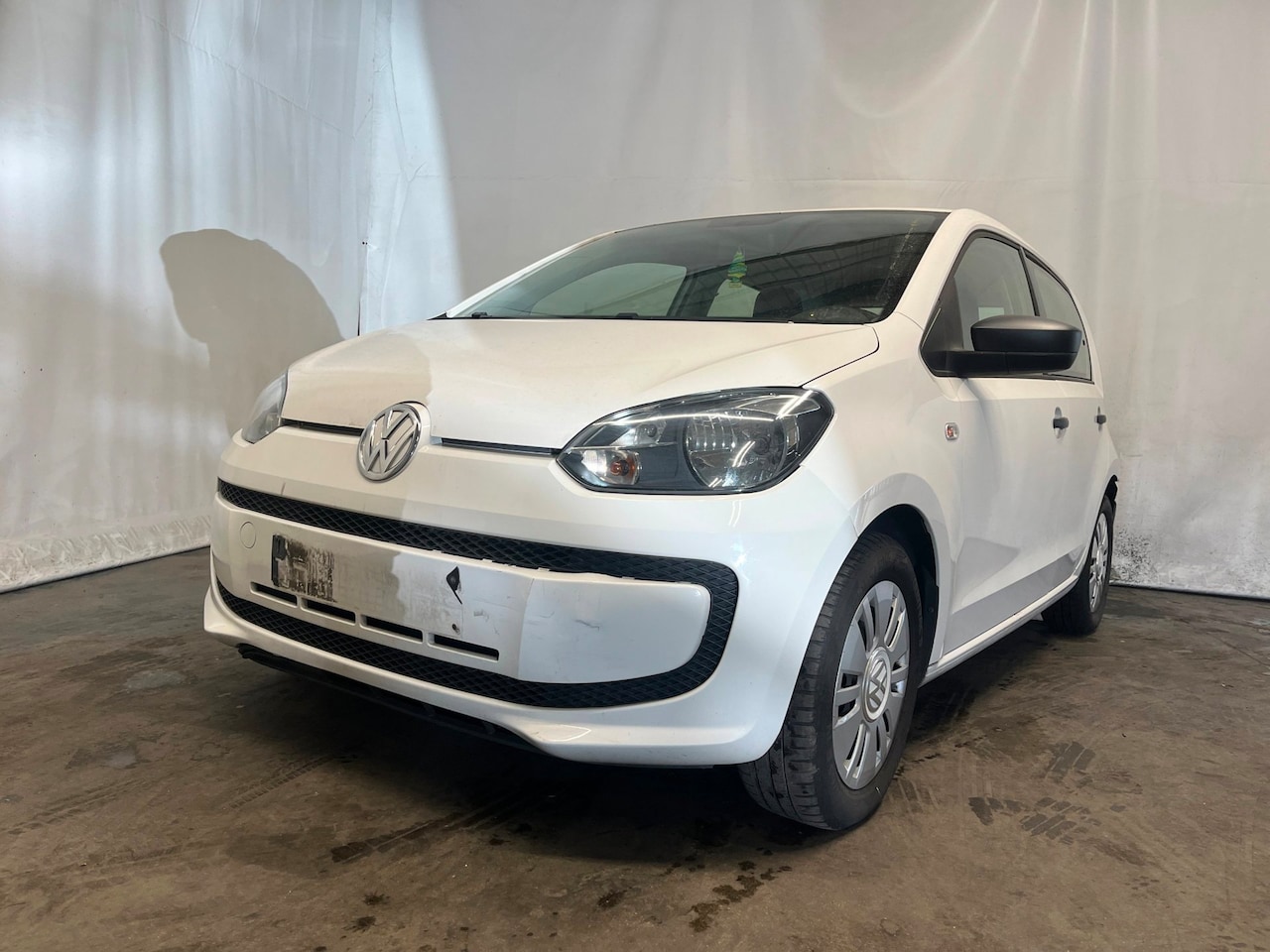 Volkswagen Up! - 1.0 take up! BlueMotion - Schade - AutoWereld.nl