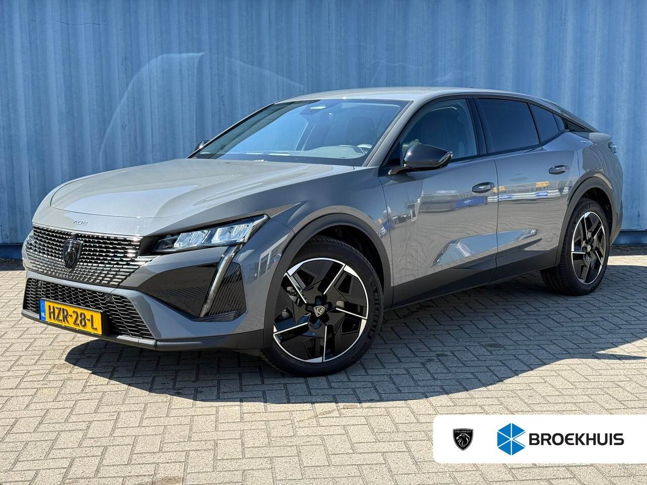 Peugeot e-408 - Allure 58 kWh | Achteruitrijcamera | Cruise control adaptief met Stop&Go | DAB ontvanger - AutoWereld.nl