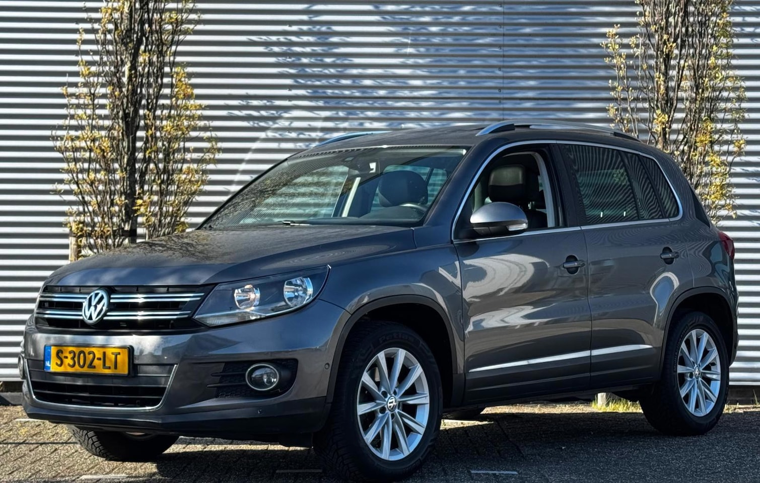 Volkswagen Tiguan - 1.4 TSI Sport&Style R-line Edition - AutoWereld.nl