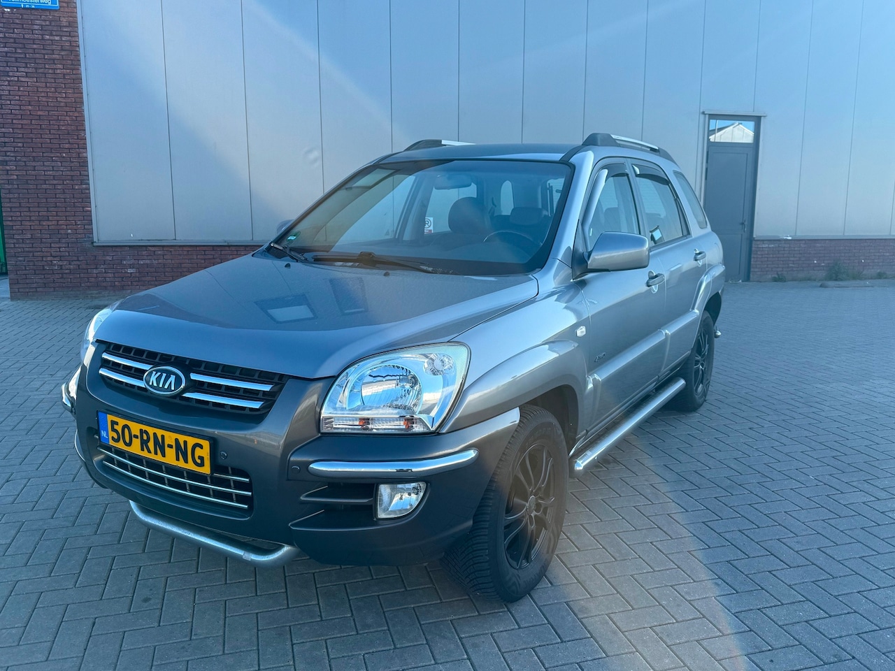 Kia Sportage - 2.7 V6 Adventure 4WD 224.000 NAP AUTOMAAT AIRCO GRIJS 2005 - AutoWereld.nl
