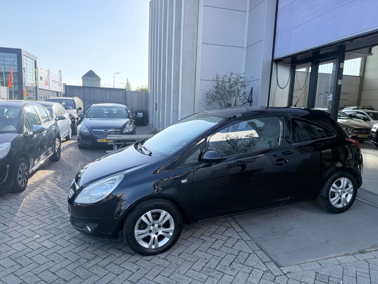 Opel Corsa - 1.4-16V Sport! 2E EIG! NAP! AIRCO! INRUIL MOGELIJK! - AutoWereld.nl