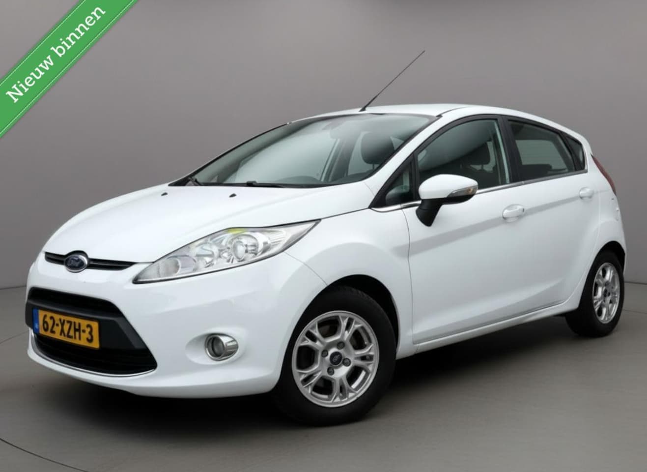 Ford Fiesta - 1.6 TDCi ECOnetic Lease Titanium Airco Cruise 12 Nl Auto Pdc MF Stuur Aux Eerste Eigenaar - AutoWereld.nl