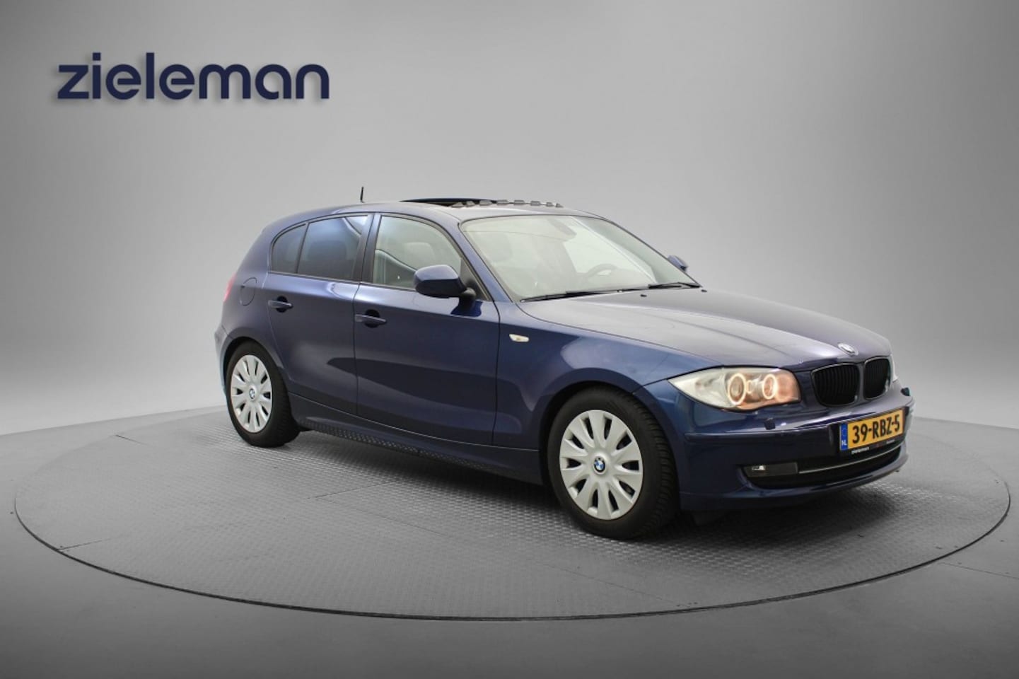 BMW 1-serie - 118i EffDyn. Ed. Business Line Ultimate Edition - panorama, Navi, Clima, Leer, Dakraam - AutoWereld.nl