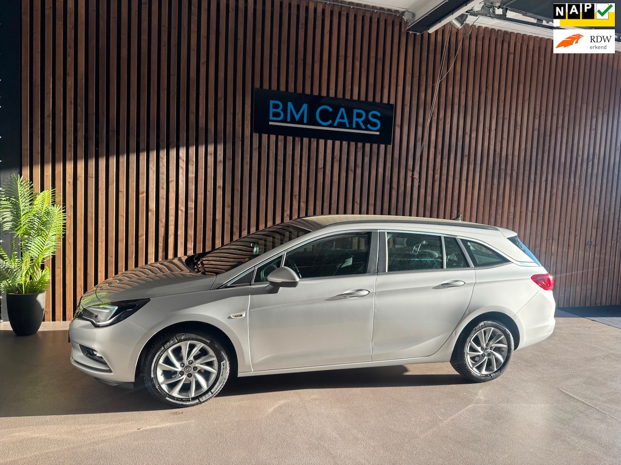 Opel Astra Sports Tourer - 1.0 Edition Airco,Trekhaak,Navigatie - AutoWereld.nl