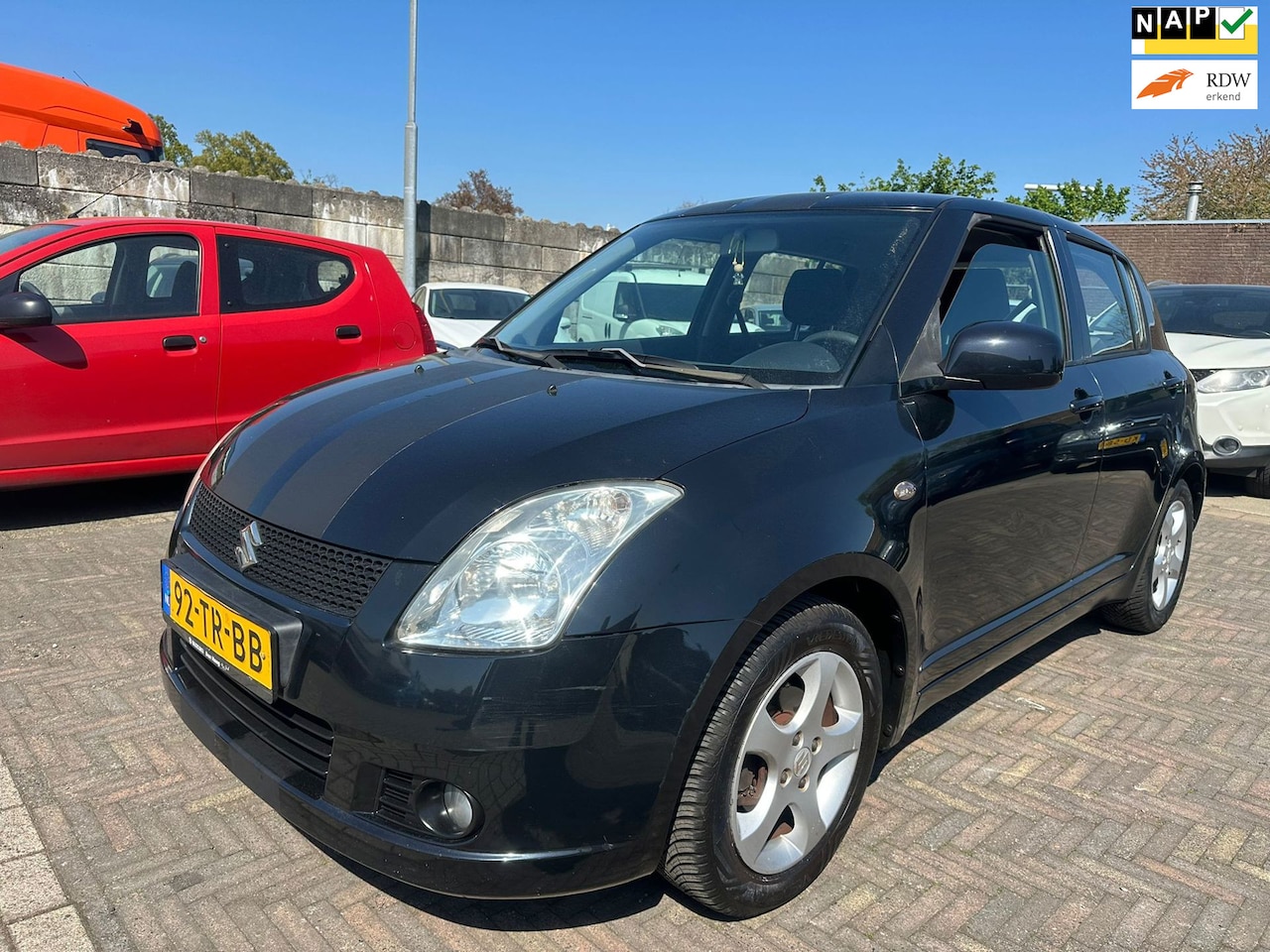Suzuki Swift - 1.3 5D AIRCO/ NW KOPPELING/ NW APK/ LM VELGEN! - AutoWereld.nl