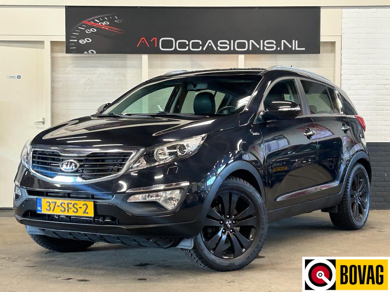 Kia Sportage - 2.0 X-clusive 4wd + LEDER + NAVI !! - AutoWereld.nl