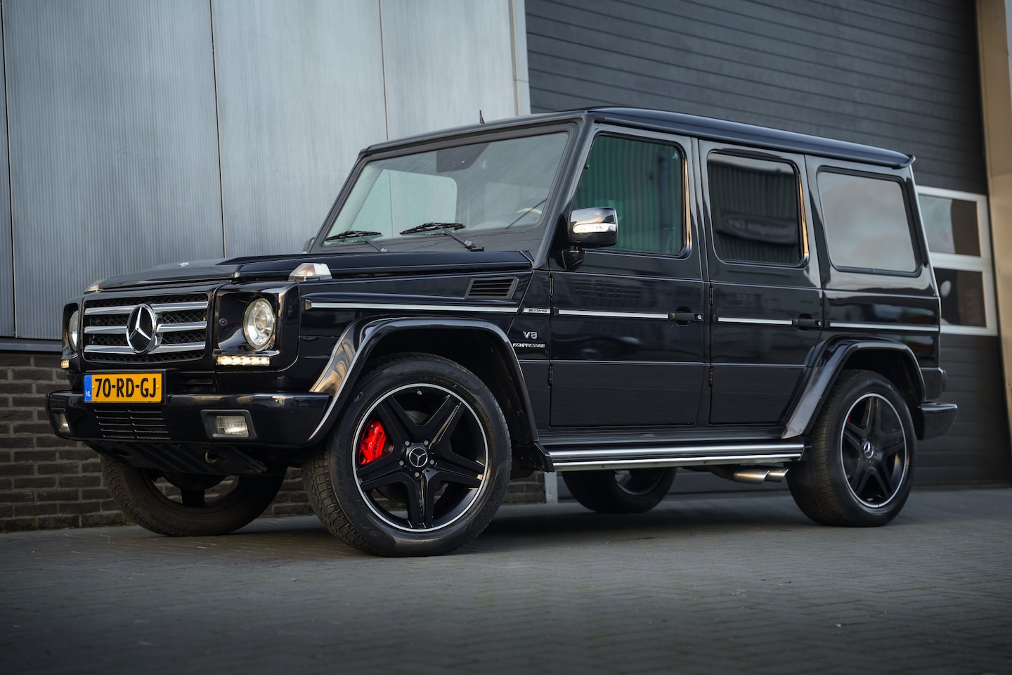 Mercedes-Benz G-klasse - AMG 55 K. 476 pk St.Wagon AMG-Sportpakket / NL-Auto/ 7-Zitter/ Leder/ Schuif-Dak/ Xenon/ L - AutoWereld.nl