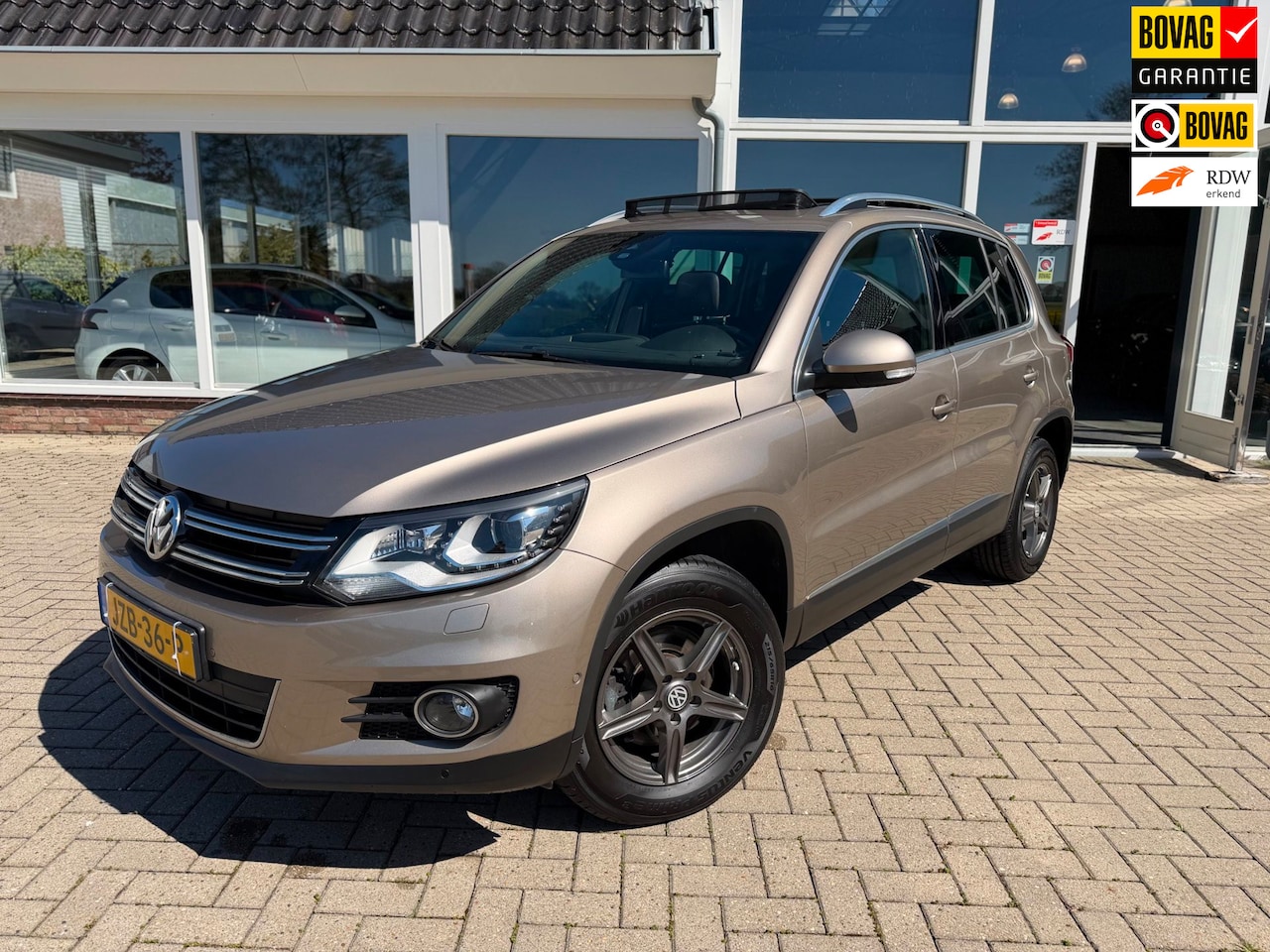 Volkswagen Tiguan - 2.0 TSI Sport&Style/ 4Motion/ Face-life model - AutoWereld.nl