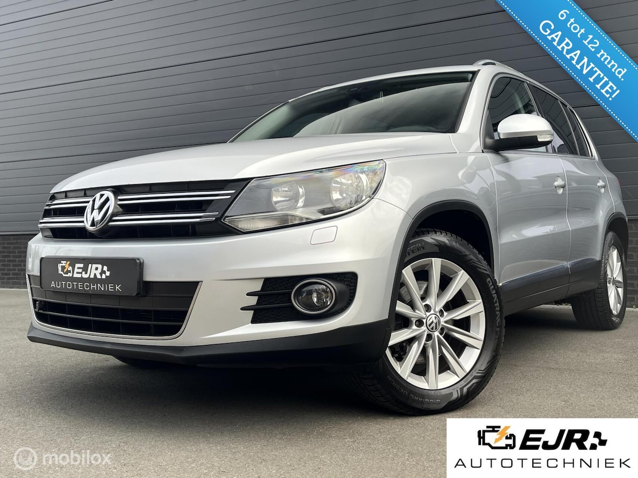 Volkswagen Tiguan - 1.4 TSI Sport&Style 4Motion CLIMA*CRUISE*HAAK*STOELVERW - AutoWereld.nl