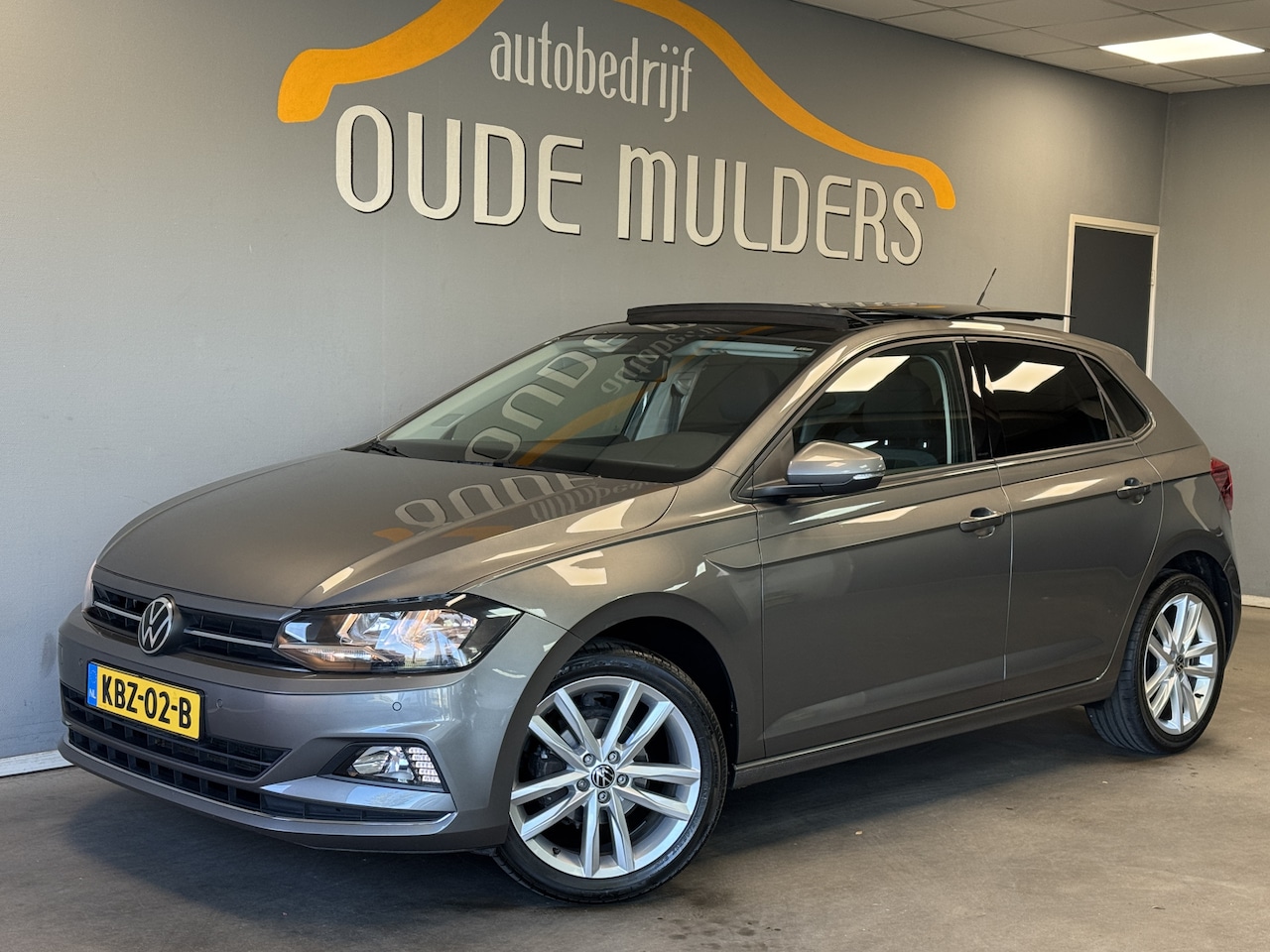 Volkswagen Polo - 1.0 TSI Panoramadak/Navi/Parkeersensoren/Stoelverwarming - AutoWereld.nl
