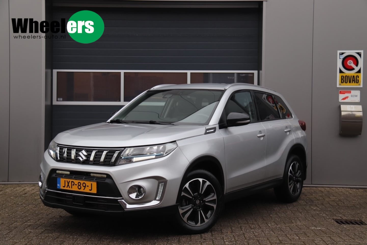 Suzuki Vitara - 1.4 Boosterjet Style Smart Hybrid 1.4 Boosterjet Style Smart Hybrid, Stoelverwarming, Camera, Cruise - AutoWereld.nl
