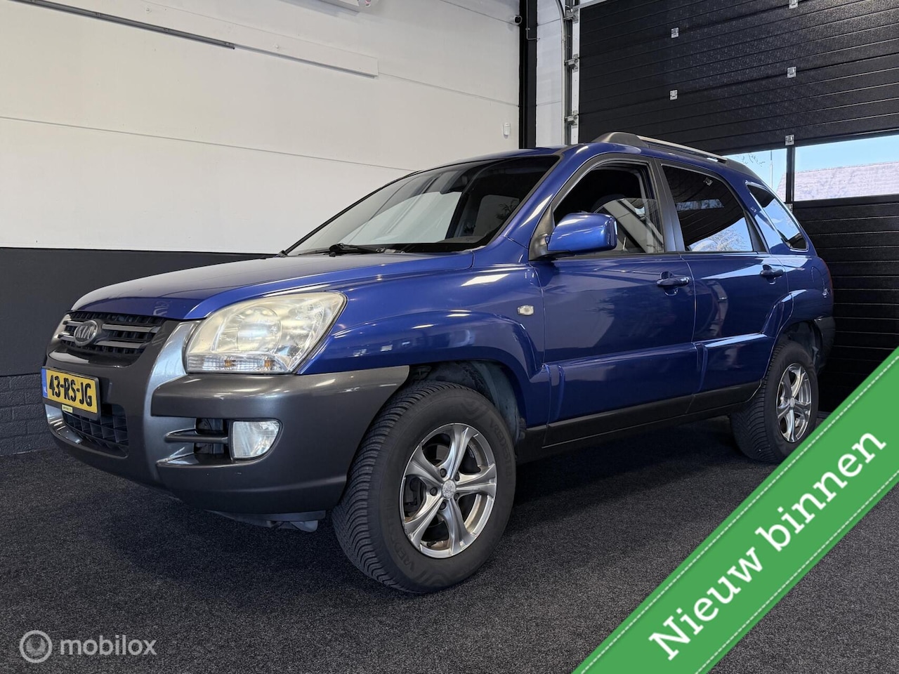 Kia Sportage - 2.0 CVVT AIRCO / CRUISE / T.HAAK/ APK:03-2027 - AutoWereld.nl